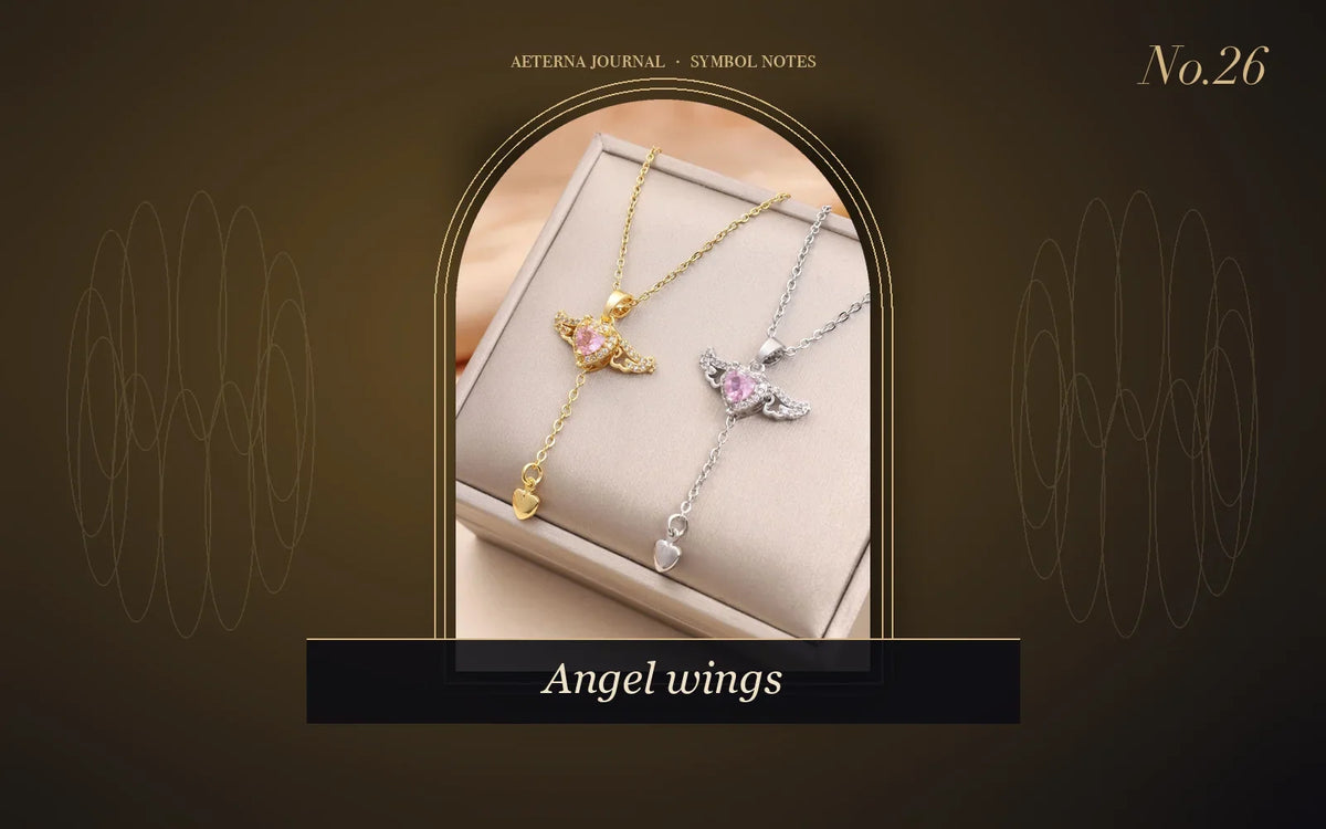 Angel wings pendant necklace with a small heart centre
