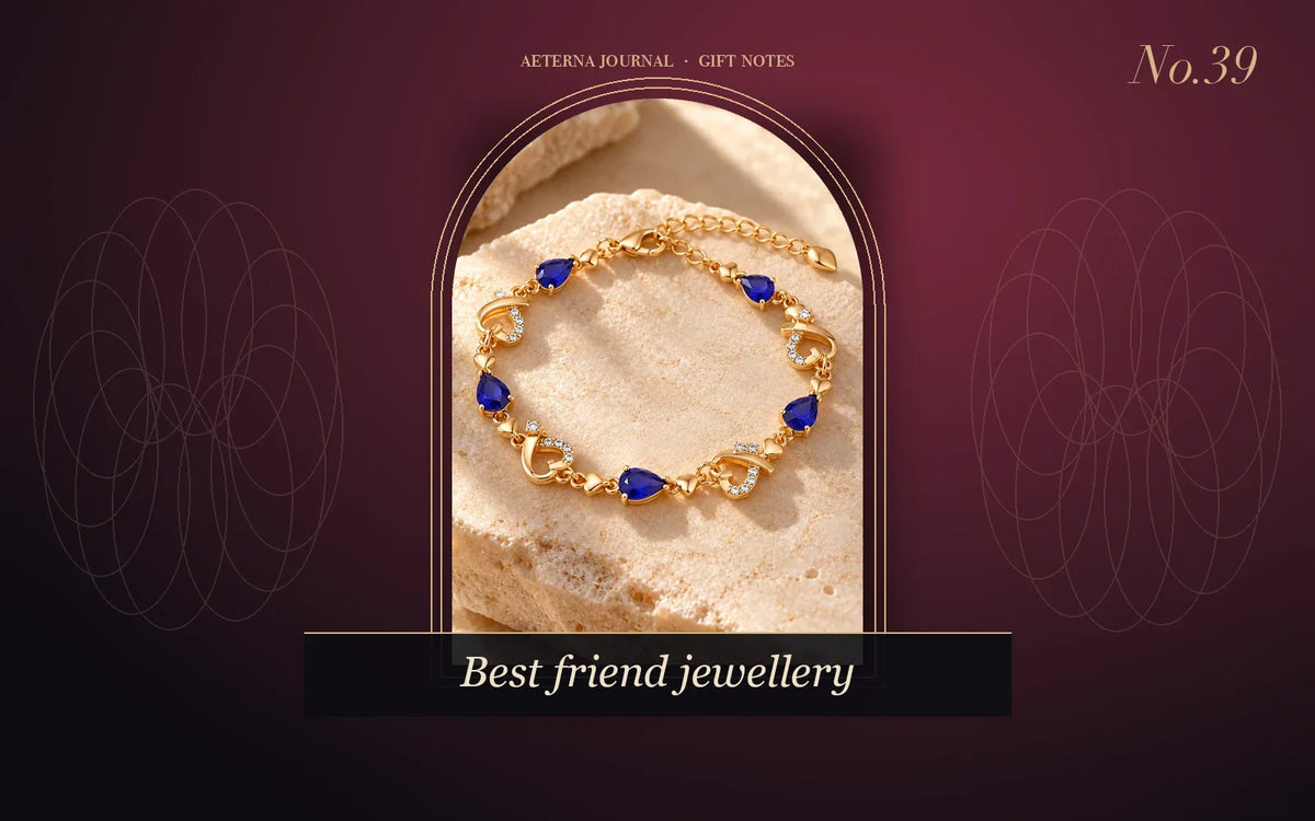 Gold-tone heart link bracelet set with blue stones