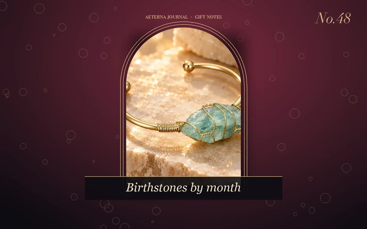 Gold-tone cuff bangle set with a raw blue-green gemstone