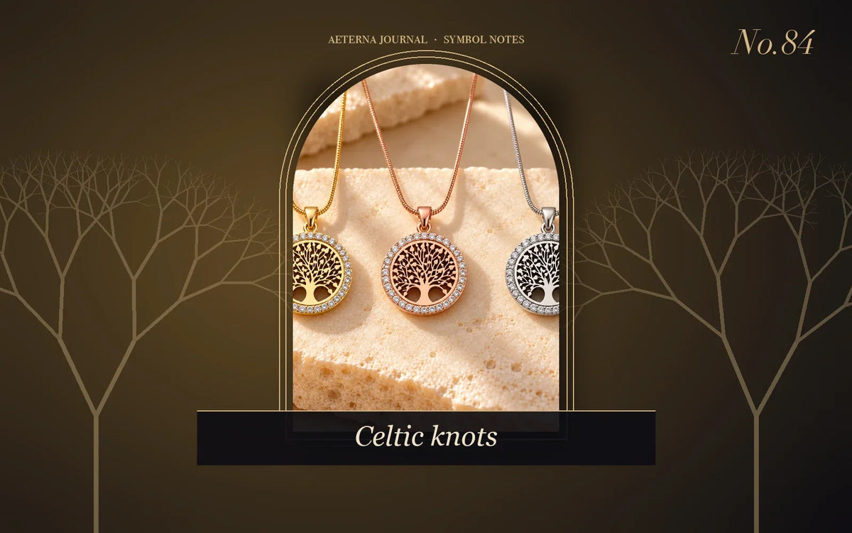 Three tree of life pendants in gold, rose-gold and silver tones