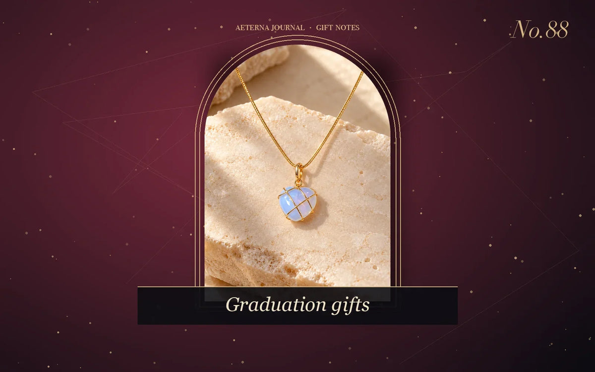 Heart pendant with an iridescent stone on a fine gold-tone chain