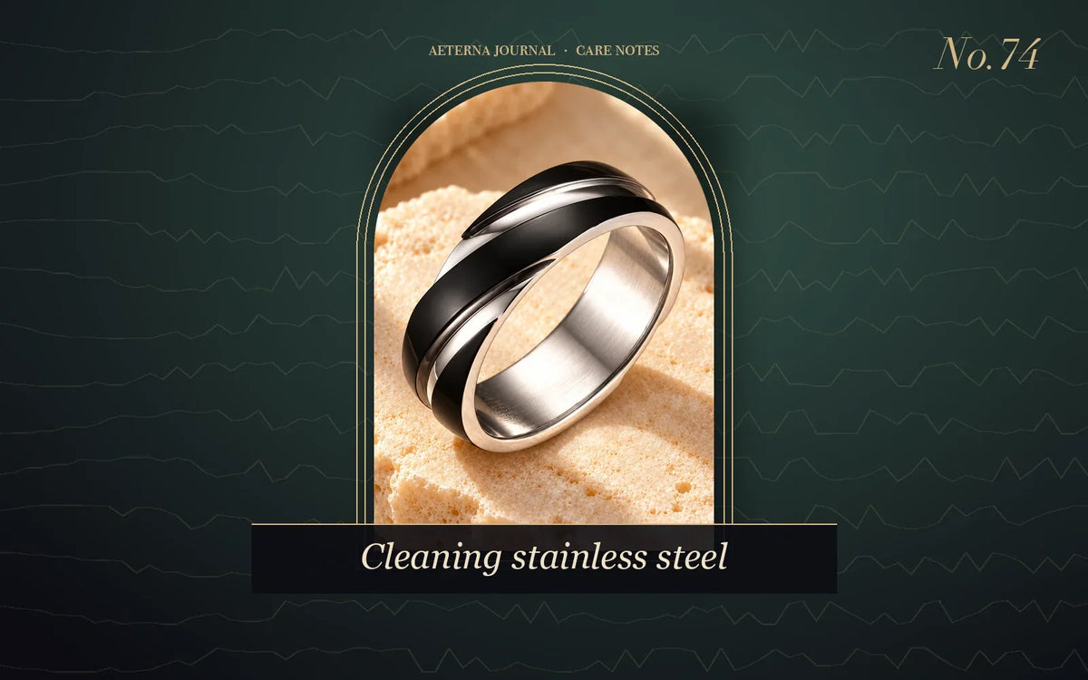 Black and silver-tone stainless steel band ring