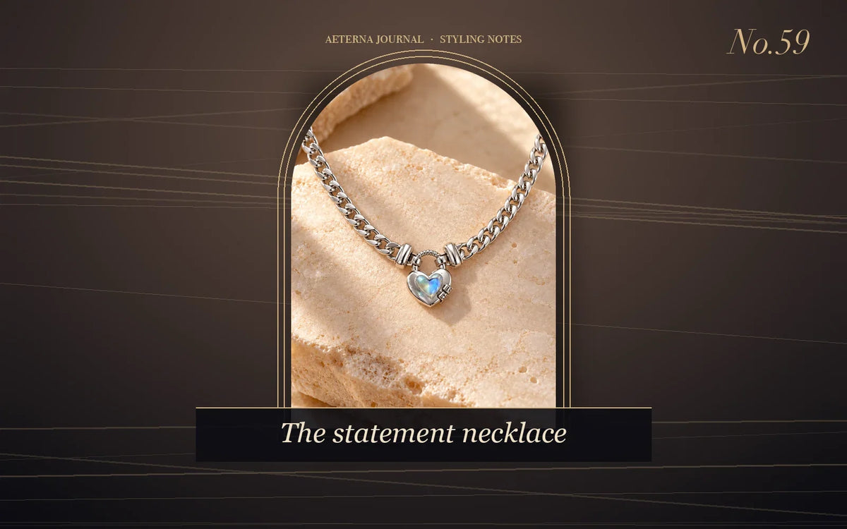 Chunky silver-tone chain necklace with a heart padlock pendant