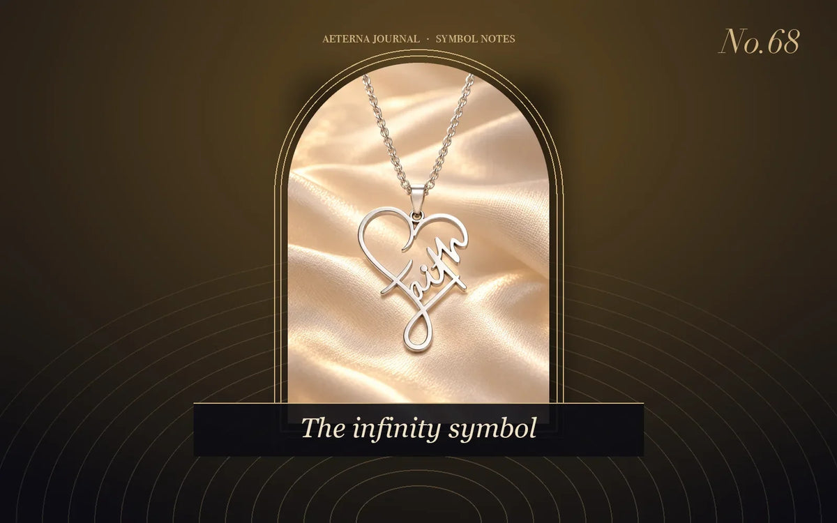 Silver-tone heart pendant with a looping script design