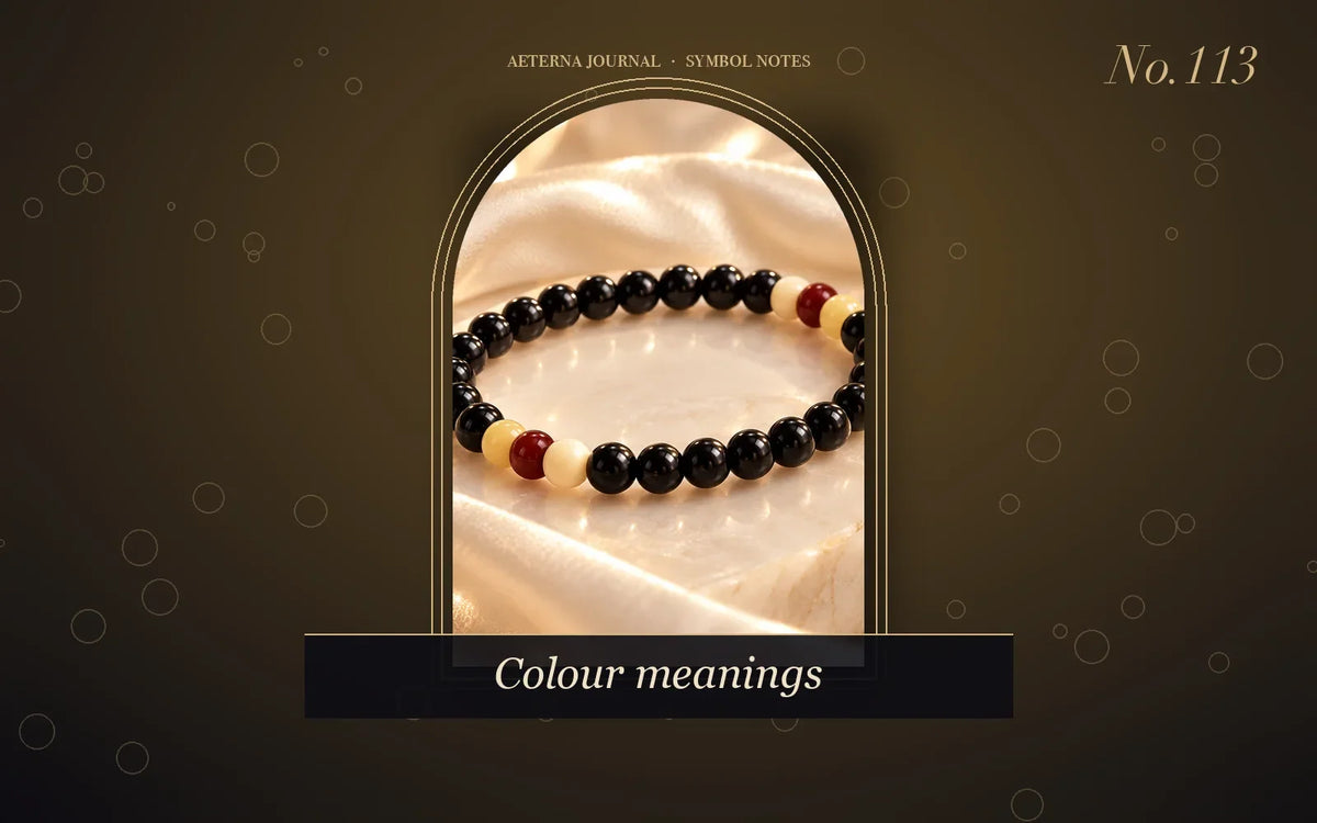 Black bead bracelet with red and cream accent beads