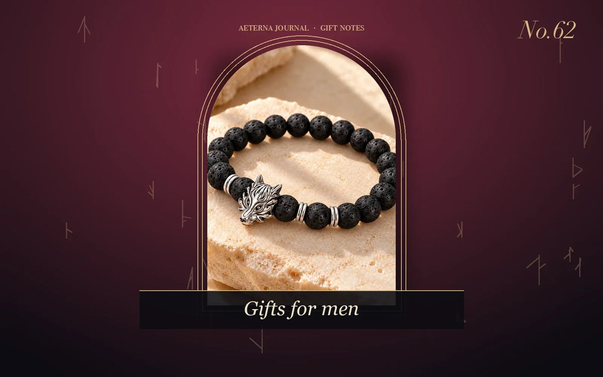 Black lava stone bead bracelet with a silver-tone wolf head