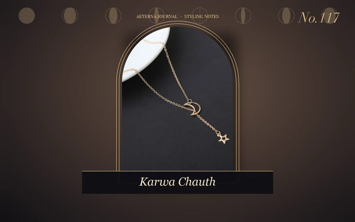 Fine gold-tone chain necklace with a small moon and star drop