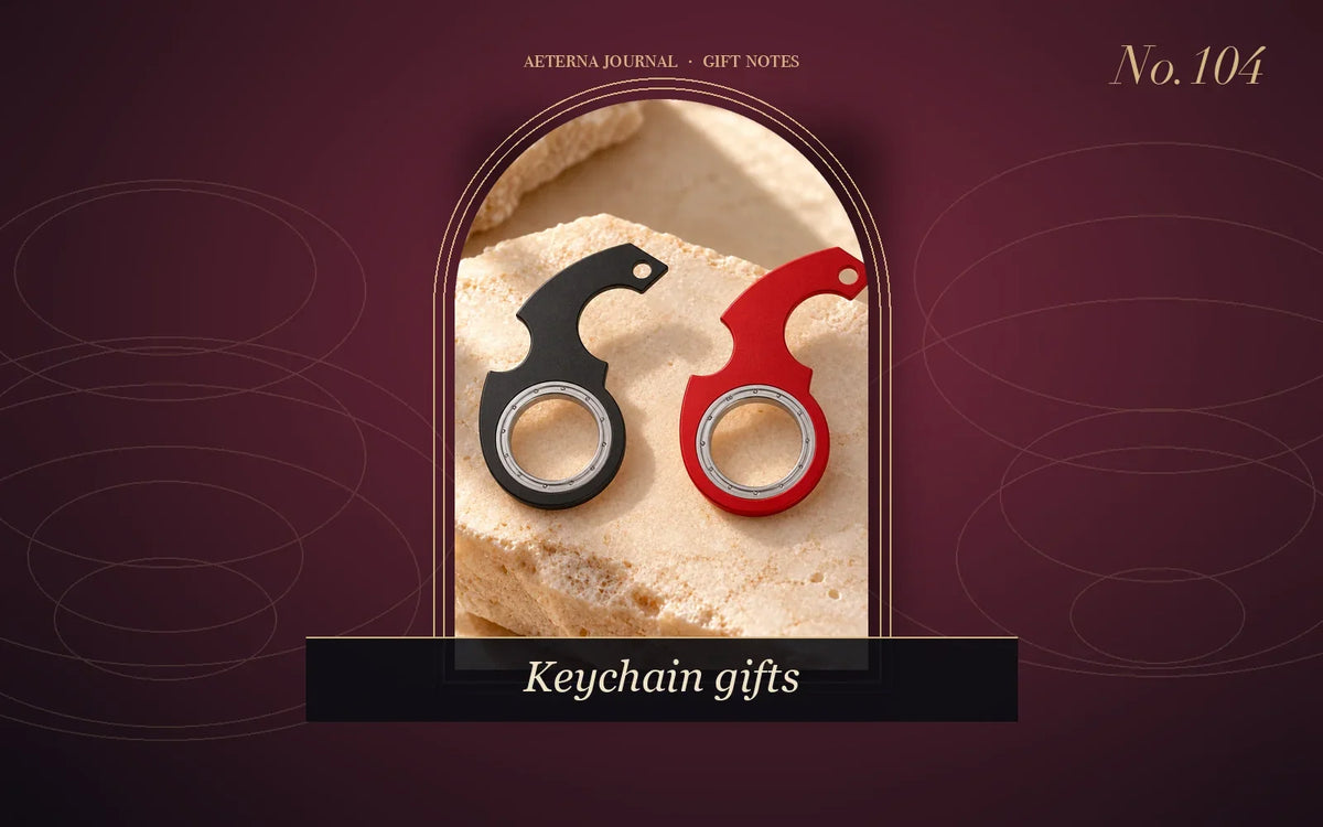 Two fidget spinner keychains in black and red