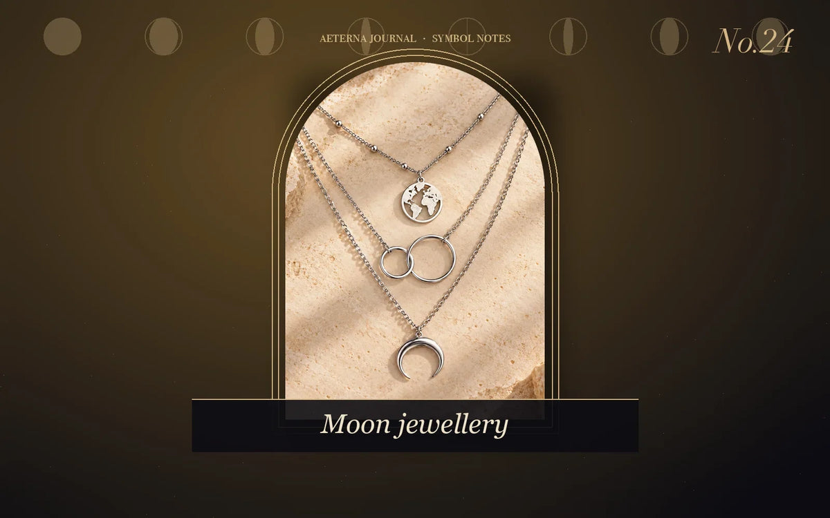 Layered moon pendant necklace on a night-sky background