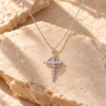 Rotating Crown Cross Pendant Necklace: illustrative concept artwork, not a product photograph