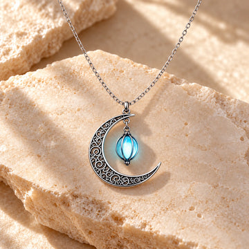 Glow-in-the-Dark Moon Pendant Necklace: illustrative concept artwork, not a product photograph