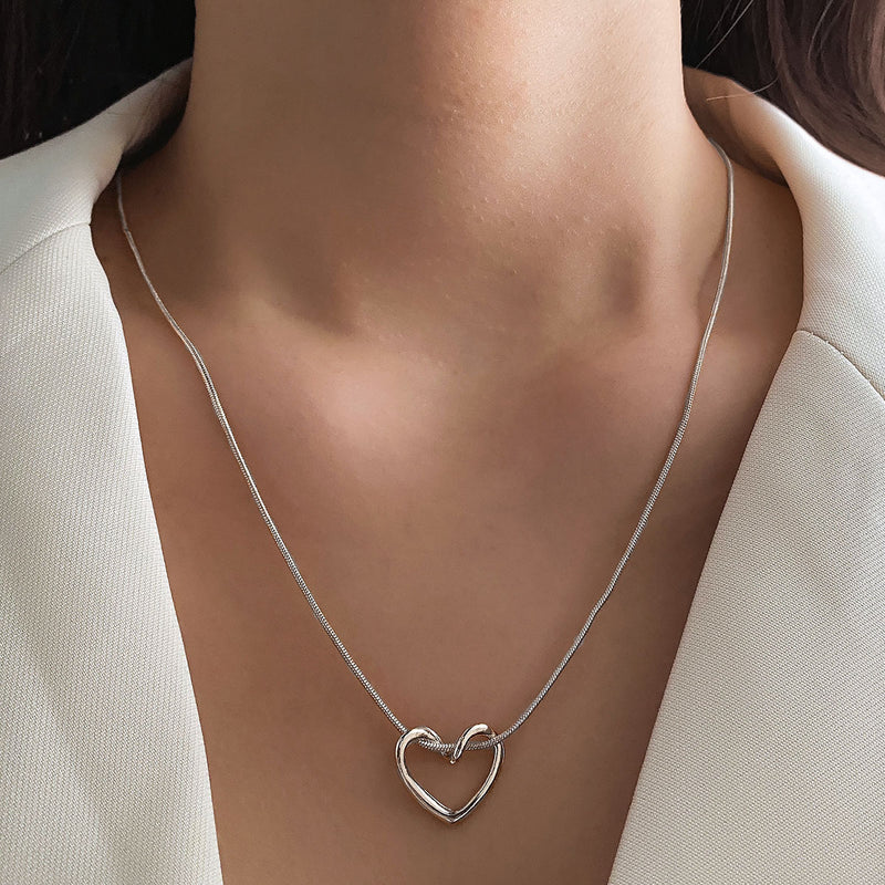 Supplier listing photo for Niche Hollow Heart Necklace